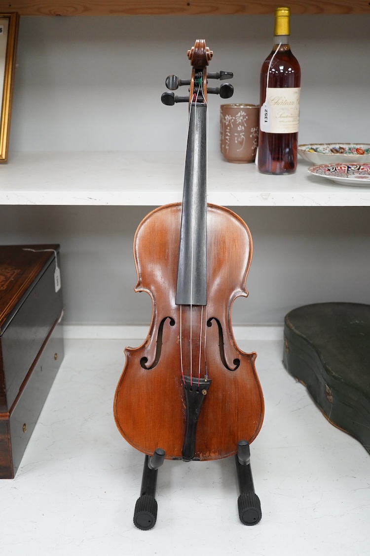 A mid 20th century cased Czech viola 15.25” body, with a fully mounted octagonal bow with plastic tip plate